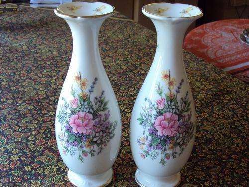A PAIR OF ROYAL ALBERT VASES